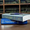 Workers' Compensation Law books in front of library shelves